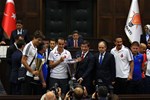 Başbakan Ahmet Davutoğlu ile Gençlik ve Spor Bakanı Akif Çağatay Kılıç, AK Parti TBMM Grup toplantısında İşitme Engelliler Futbol ve Voleybol Milli Takımları'nı kabul etti.
